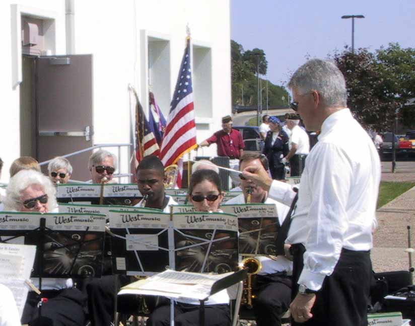 Mark Eveleth conducts the band at the 2003 Memorial Day service